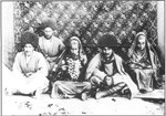RUG AS BACKDROP TO PEOPLE