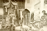 Hall interior with rugs hanging